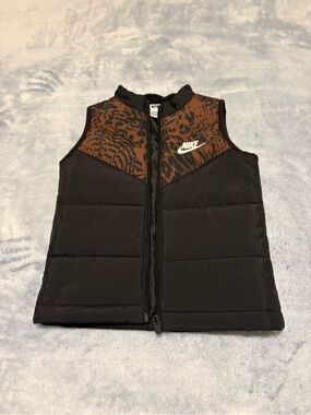 Nike Kids Black and Brown Puffer Vest with Animal Print Yoke